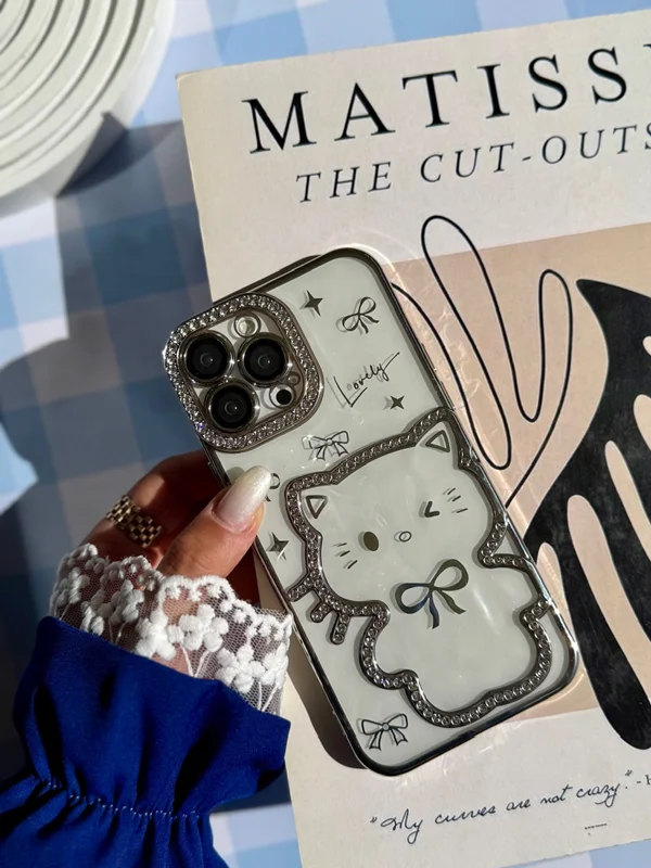 Clear 3D Cat Design Phone Case with Rhinestone Details iPhone 16 phone