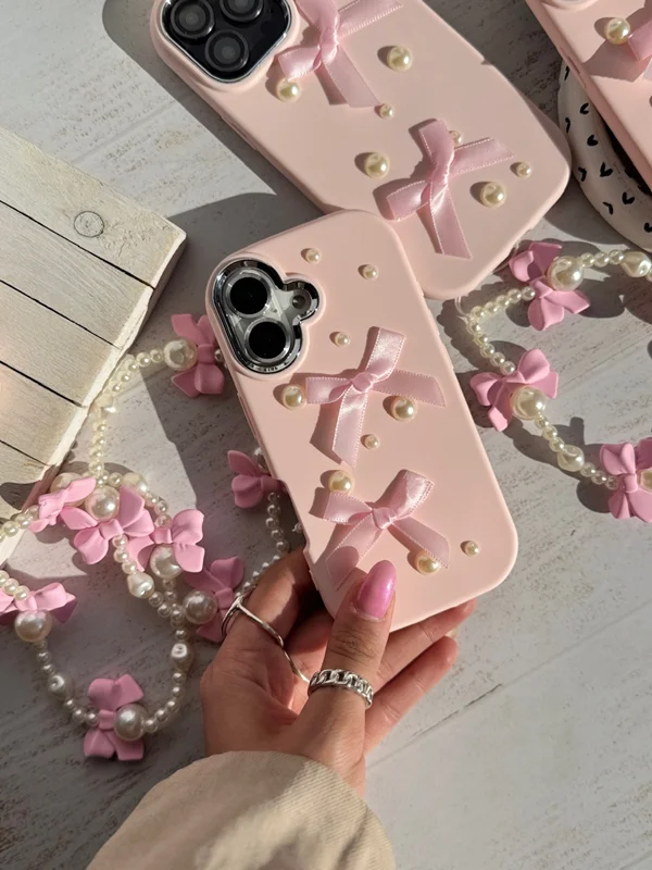 قاب گوشی آیفون 13 پرومکس طرح پاپیون و مروارید با آویز