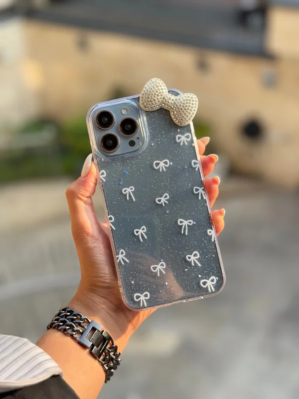 Shine iPhone 16 Pro case with bow tie design
