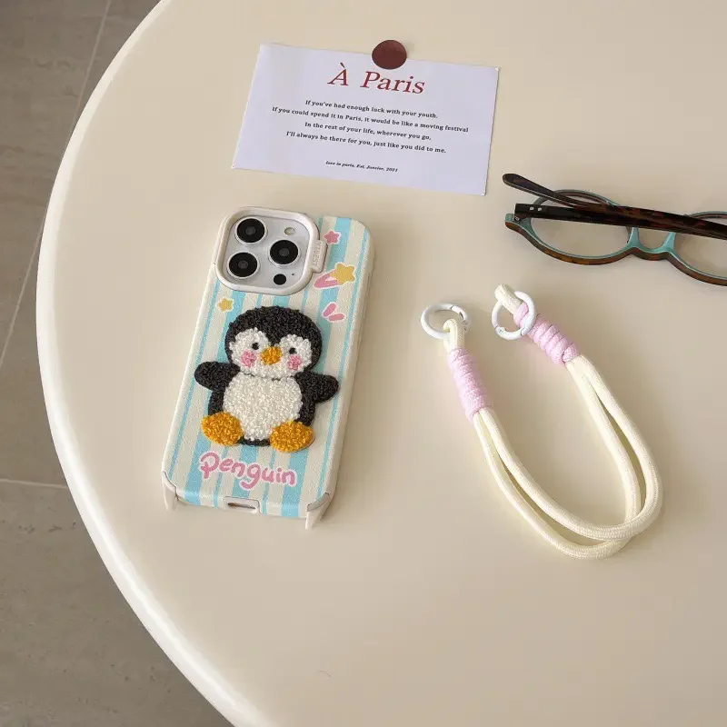 Penguin iPhone 16 case with double-hook wrist strap