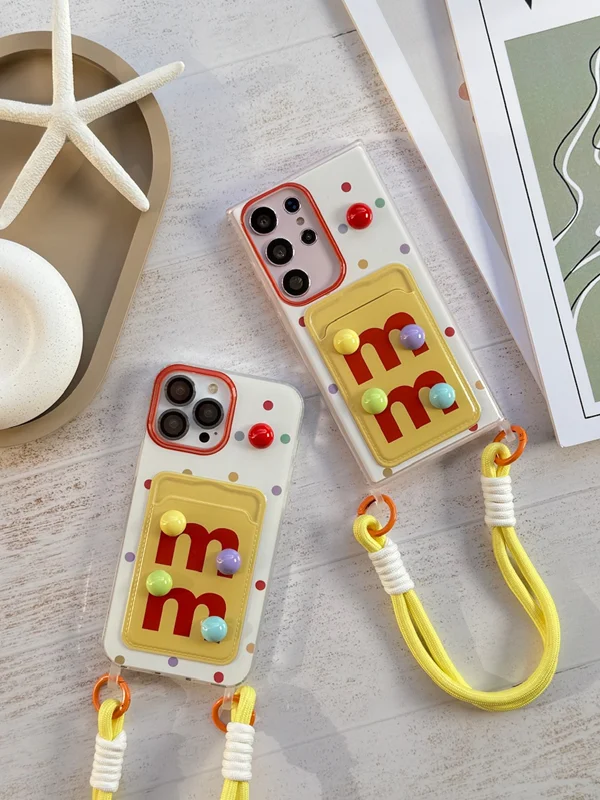 iPhone 12 and iPhone 12 Pro case with card holder with M&M embossing sticker strap