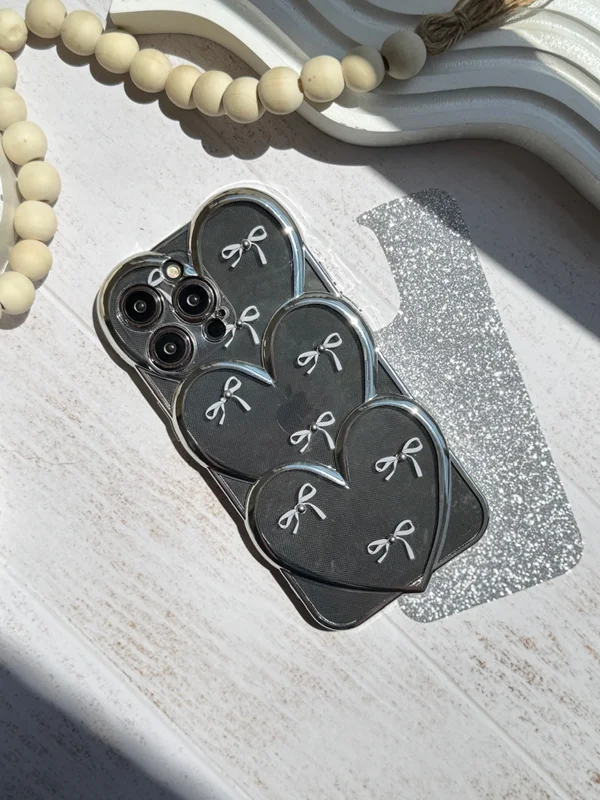 Embossed gemstone bow tie heart iPhone case with shine sheet