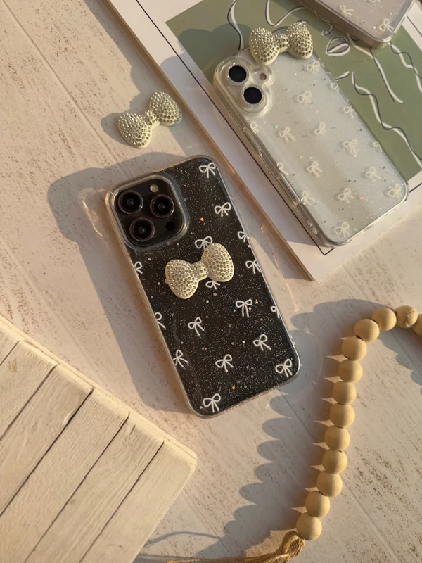 Shine iPhone 16 Pro case with bow tie design
