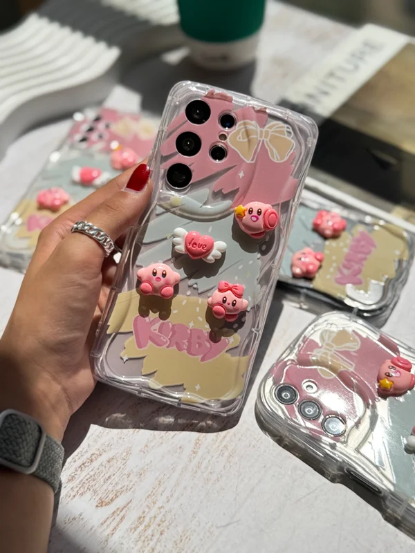 Samsung S24 Ultra frame with a fancy Kirby doll