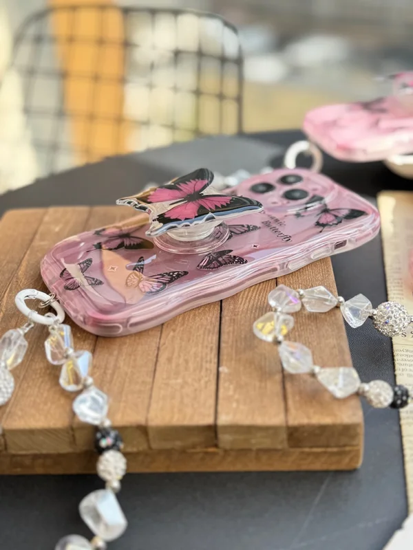 Pink butterfly iPhone 13 Pro case with pendant